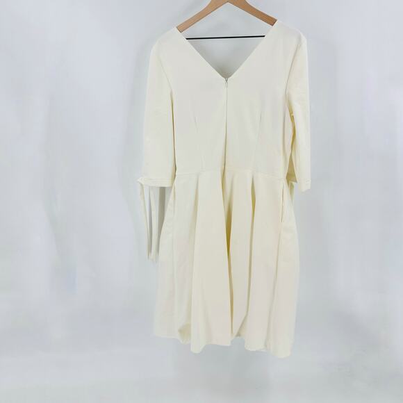 Unique Vintage Plus Size 1950s Ivory Delores Swing Dress with Sleeves - Picture 3 of 12
